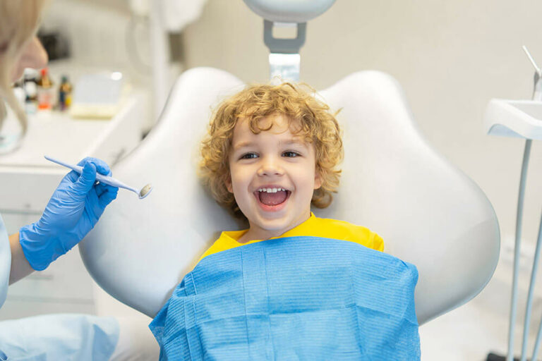 smiling child at dentist appointment